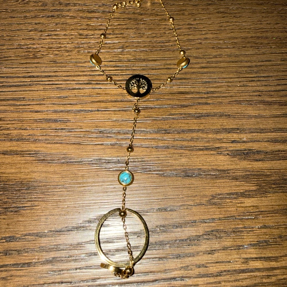 Bracelet and attached ring set